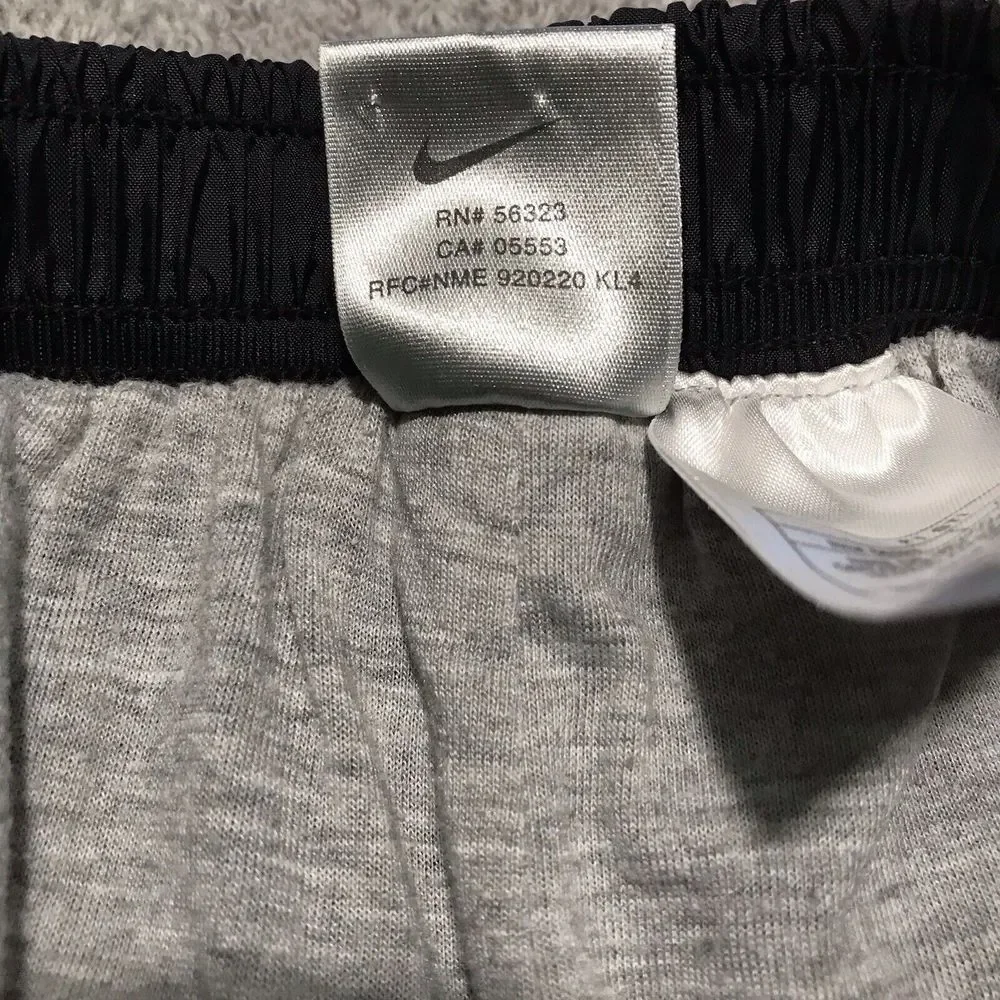 Vintage Nike Women's Black Ankle Zip Nylon 90's Track Pants Lined‎ Medium 8-10